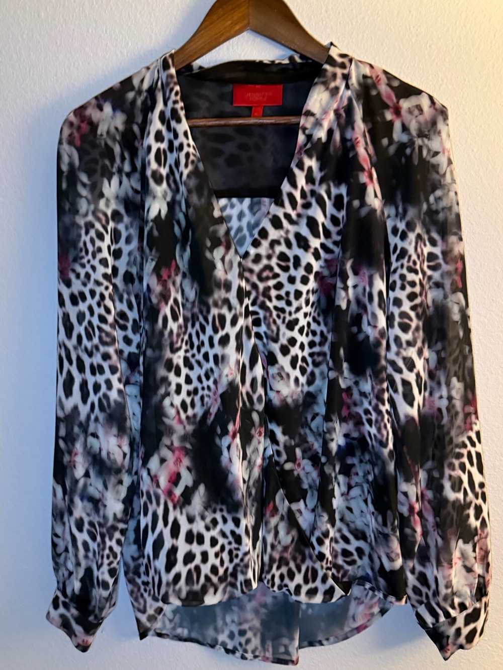 Jennifer Lopez Black and White Animal Print V-Neck Blouse with Pink Accents